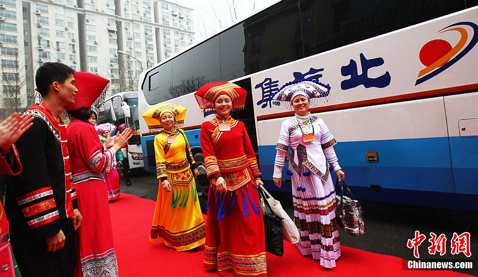 NPC deputies from Guangxi Zhuang Autonomous Region arrive in Beijing to attend the NPC and CPPCC annual sessions, March 2, 2012. The Fifth Session of the 11th NPC is scheduled to open in Beijing on March 5.