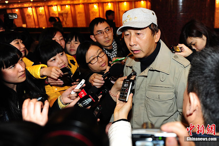 CPPCC member Feng Xiaoning is seen at Beijing International Hotel to attend the CPPCC and National People&apos;s Conference (NPC) annual sessions, March 2, 2012.