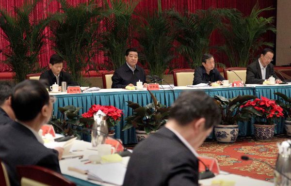 Jia Qinglin (3rd R back), chairman of the National Committee of the Chinese People's Political Consultative Conference (CPPCC), addresses a meeting on Tibet and other Tibetan-inhabited areas in Beijing, capital of China, March 1, 2012. 