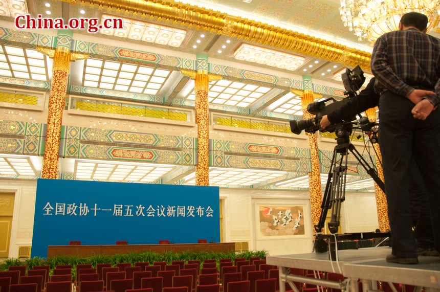 TV crews from China Central Television (CCTV) sets up video camera at the Golden Hall in the Great Hall of the People in Beijing, China, on the afternoon of Thursday, March 1, 2012, one day before the press conference of Chinese People&apos;s Political Consultative Conference (CPPCC) scheduled on Friday afternoon, March 2, 2012. 