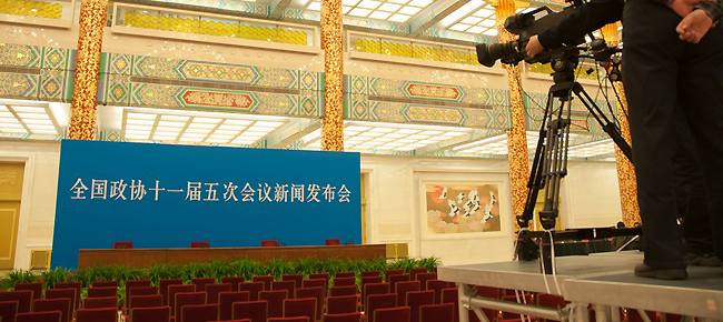 TV crews from China Central Television (CCTV) sets up video camera at the Golden Hall in the Great Hall of the People in Beijing, China, on the afternoon of Thursday, March 1, 2012, one day before the press conference of Chinese People's Political Consultative Conference (CPPCC) scheduled on Friday afternoon, March 2, 2012.