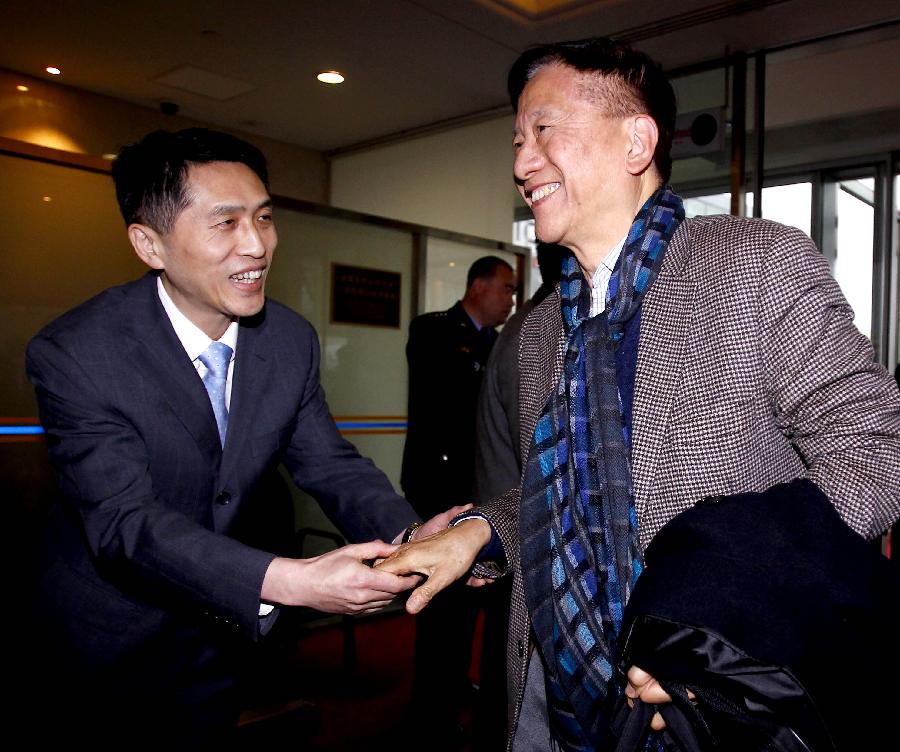 Ng Ching-fai, a deputy to the Fifth Session of the 11th National People's Congress (NPC) from south China's Hong Kong Special Administrative Region arrives in Beijing, capital of China, March 2, 2012. 