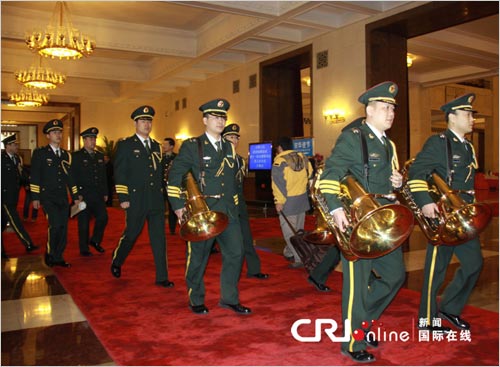 Military band arrives in the Great Hall of the People.