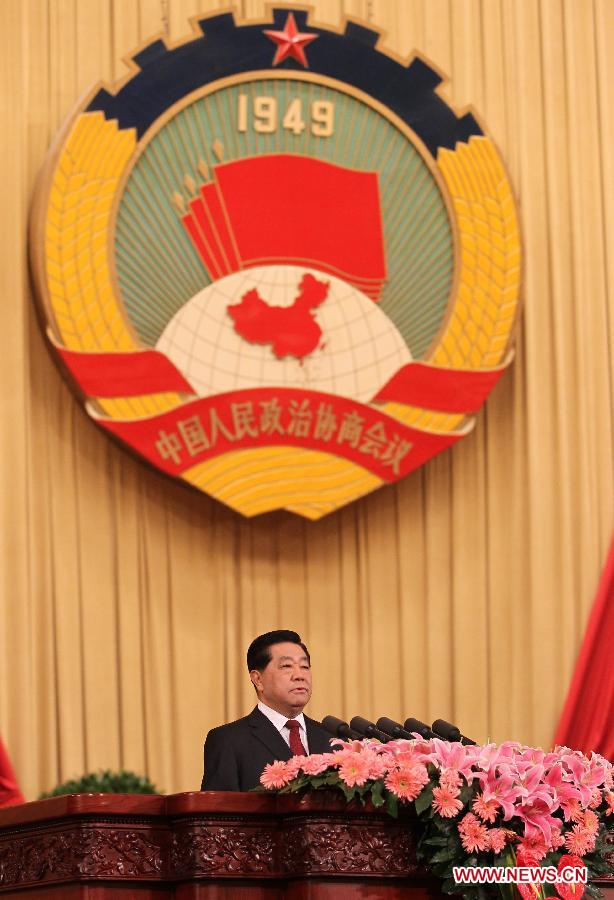 Jia Qinglin, chairman of the National Committee of the Chinese People's Political Consultative Conference (CPPCC), delivers a report at the Great Hall of the People in Beijing, capital of China, March 3, 2012. 