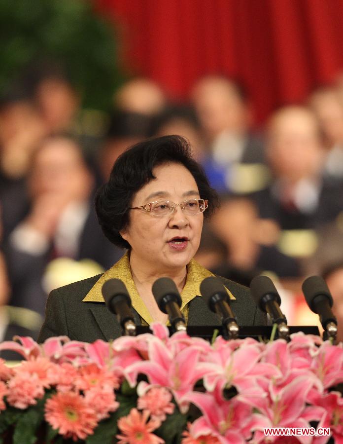 Lin Wenyi, vice chairwoman of the National Committee of the Chinese People's Political Consultative Conference (CPPCC), delivers a report at the Great Hall of the People in Beijing, capital of China, March 3, 2012. 