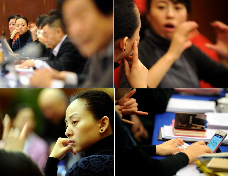 This combined photo shows Tai Lihua, a member of the 11th National Committee of the Chinese People's Political Consultative Conference (CPPCC), joining in a panel discussion of the Fifth Session of the 11th CPPCC National Committee with the help of a sign language interpreter in Beijing, capital of China, March 4, 2012.