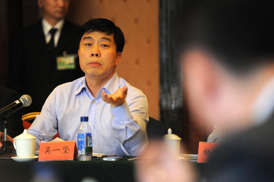 Wu Yijian, a member of the 11th National Committee of the Chinese People's Political Consultative Conference (CPPCC), speaks during a panel discussion of the Fifth Session of the 11th CPPCC National Committee in Beijing, capital of China, March 4, 2012.