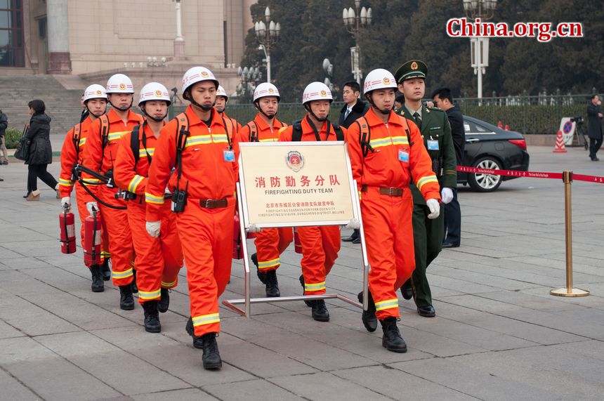 Soldiers with the fire brigade that patrol the perimeter of the Great Hall of the People, the venue of China&apos;s National People&apos;s Congress.