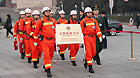 Soldiers with the fire brigade that patrol the perimeter of the Great Hall of the People, the venue of China's National People's Congress.
