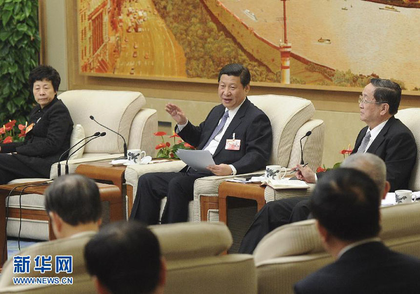 Chinese Vice-President Xi Jinping visits deputies to the Fifth Session of the 11th National People&apos;s Congress (NPC) from east China&apos;s Shanghai and joins their panel discussion in Beijing, capital of China, March 5, 2012.