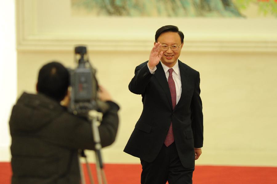 Chinese Foreign Minister Yang Jiechi walks in before a news conference on the sidelines of the Fifth Session of the 11th National People&apos;s Congress (NPC) at the Great Hall of the People in Beijing, China, March 6, 2012.