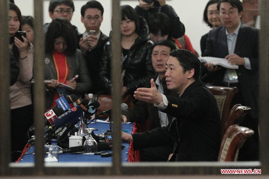 Li Daokui, a member of the 11th National Committee of the Chinese People's Political Consultative Conference (CPPCC) and advisor of the Monetary Policy Committee of the People's Bank of China, speaks during a press conference in Beijing, capital of China, March 6, 2012.