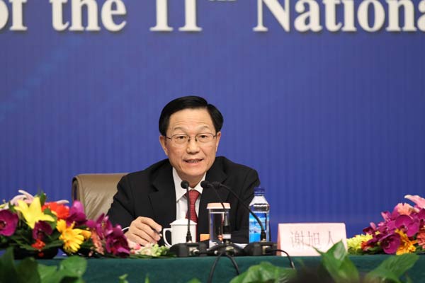 Minister of Finance Xie Xuren gives a press conference on China&apos;s fiscal policy in Beijing, March 6, 2012.