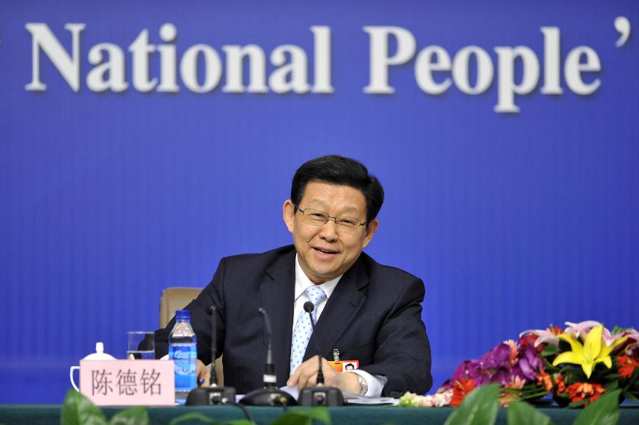 Chinese Commerce Minister Chen Deming reacts during a news conference of the Fifth Session of the 11th National People&apos;s Congress (NPC) in Beijing, China, March 7, 2012.