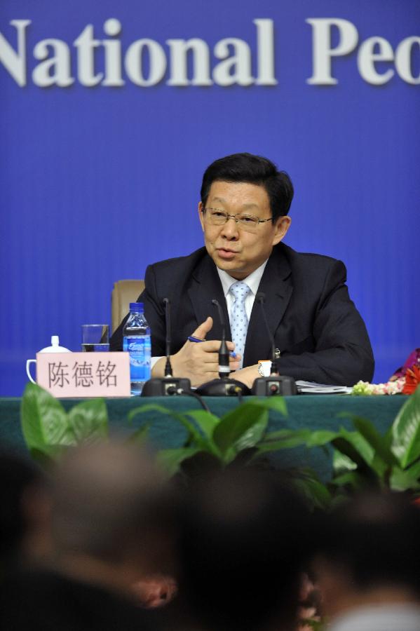 Chinese Commerce Minister Chen Deming answers questions of journalists during a news conference of the Fifth Session of the 11th National People's Congress (NPC) in Beijing, China, March 7, 2012.