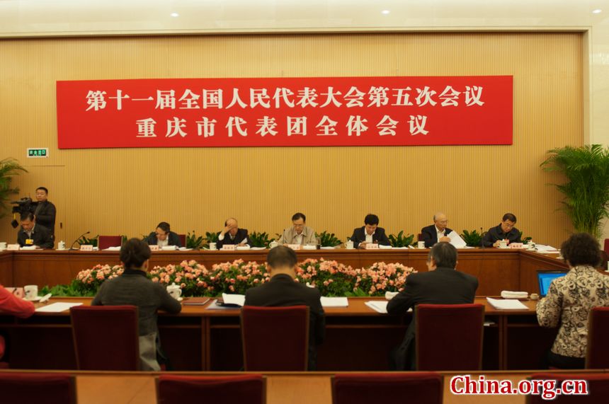 Chongqing Municipality&apos;s delegation to the National People&apos;s Congress (NPC)holds a panel discussion session on Tuesday afternoon, March 6, 2012 at the Hotel affiliated to the Great Hall of the People, Beijing, China. [China.org.cn]