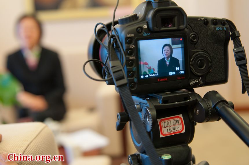 Sheng Ya&apos;nong, Party Chief of Dadukou District, Chongqing Municipality takes a video interview after the panel discussion on Tuesday afternoon, March 6, 2012 at the Hotel affiliated to the Great Hall of the People, Beijing, China. [China.org.cn]