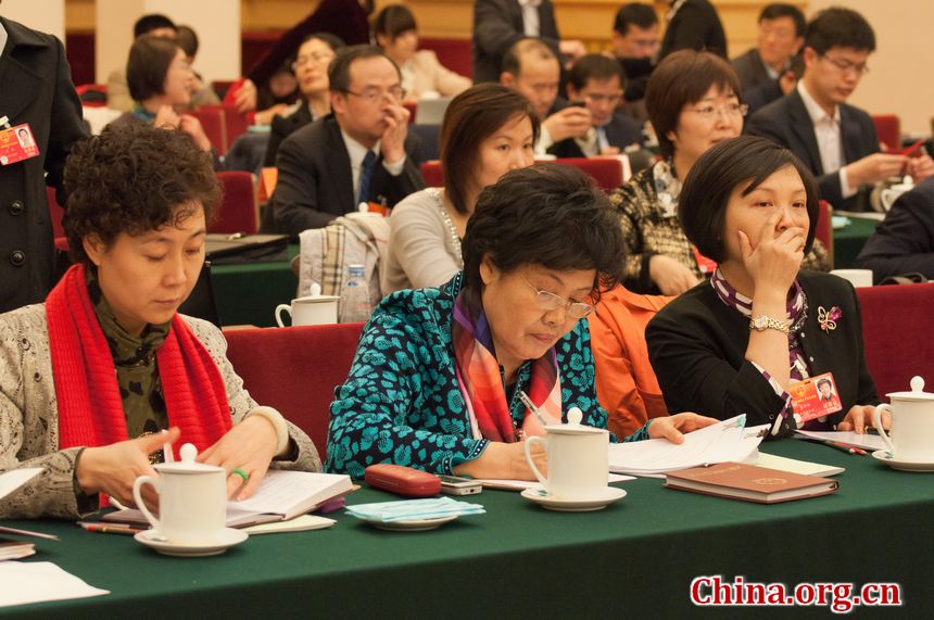 The Jiangsu delegation to the 11th National People&apos;s Congress (NPC) holds an all-member panel discussion session on Wednesday afternoon at the Jiangsu Hall in the Great Hall of the People, Beijing, China. [China.org.cn]