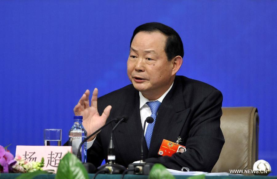 Yang Chao, a member of the 11th National Committee of the Chinese People's Political Consultative Conference (CPPCC), speaks during a news conference of the Fifth Session of the 11th CPPCC National Committee on the construction and management of housing for low-income residents in Beijing, capital of China, March 7, 2012.