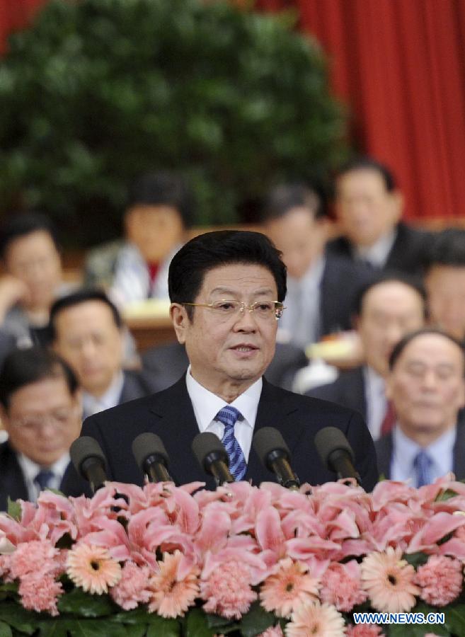 Wang Zhaoguo, vice chairman of the Standing Committee of the National People's Congress (NPC), gives explanations of the draft amendment to the Criminal Procedural Law during the second plenary meeting of the Fifth Session of the 11th NPC at the Great Hall of the People in Beijing, capital of China, March 8, 2012.