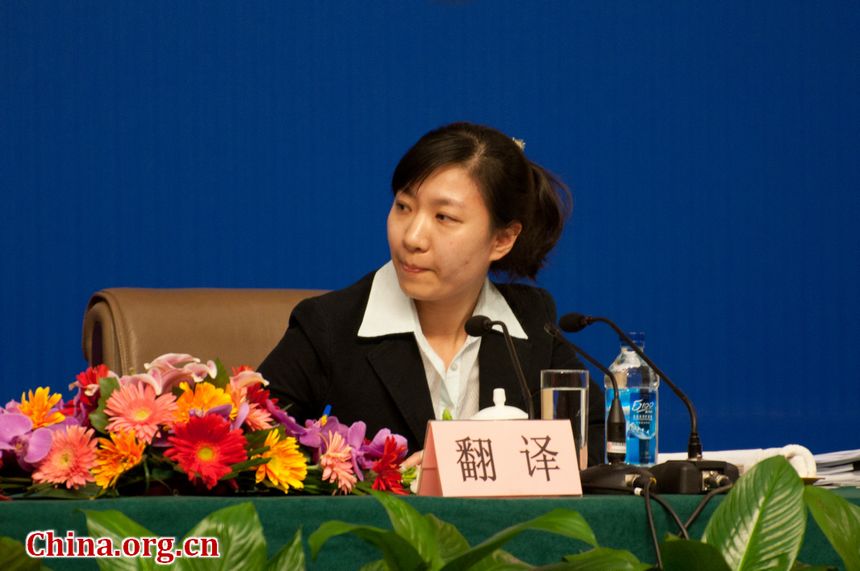 The Legislative Affairs Commission of the 11th National People&apos;s Congress holds a press conference on Thursday afternoon, March 8, 2012, at the NPC Press Center of China Central Television (CCTV)&apos;s Media Center. During the press conference, the Commission&apos;s vice chairman Lang Sheng takes from the press questions concerning the amendments to China&apos;s Criminal Procedure Law. The photo shows the interpreter at the press conference. [China.org.cn]