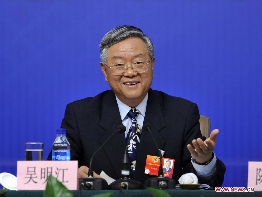 Wu Mingjiang, a member of the 11th National Committee of the Chinese People's Political Consultative Conference (CPPCC) answers questions from journalists during a news conference of the Fifth Session of the 11th CPPCC National Committee on the reform of medical, health care services in Beijing, capital of China, March 10, 2012.