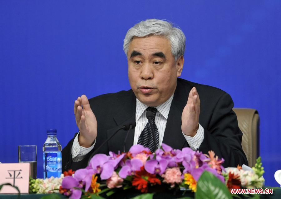 Zhao Ping, a member of the 11th National Committee of the Chinese People's Political Consultative Conference (CPPCC) answers questions from journalists during a news conference of the Fifth Session of the 11th CPPCC National Committee on the reform of medical, health care services in Beijing, capital of China, March 10, 2012.