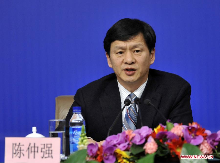 Chen Zhongqiang, a member of the 11th National Committee of the Chinese People's Political Consultative Conference (CPPCC) answers questions from journalists during a news conference of the Fifth Session of the 11th CPPCC National Committee on the reform of medical, health care services in Beijing, capital of China, March 10, 2012.