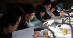 Staff members work at the bulletin group of the secretariat of the Fifth Session of the 11th National People's Congress (NPC) in Beijing, capital of China, March 11, 2012.