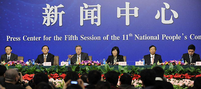 Zhou Xiaochuan (3rd L), governor of the People's Bank of China (PBOC), deputy governor of the PBOC Hu Xiaolian (3rd R) and Liu Shiyu (2nd L), vice governor of the PBOC and director of the State Administration of Foreign Exchange (SAFE) Yi Gang (2nd R) attend a press conference on monetary policy and financial reform on the sidelines of the Fifth Session of the 11th National People's Congress (NPC) in Beijing, capital of China, March 12, 2012.