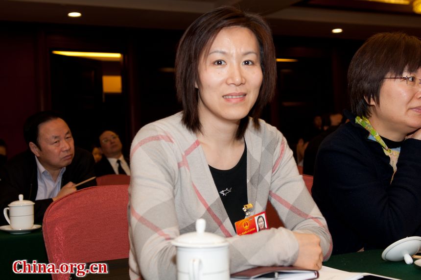 Ge Fei, ex-Olympic women&apos;s badminton champion and now a senior official with Jiangsu Province&apos;s sports authorities attends China&apos;s 11th National People&apos;s Congress. [China.org.cn]