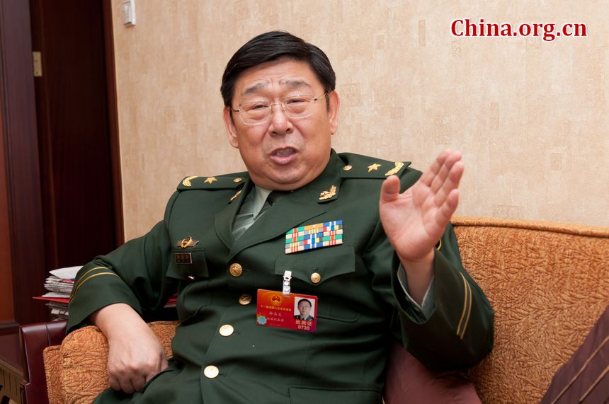 Sun Yuyi, Major General of China's armed police force, and Jiangsu Province's delegate to the country's 11th National People's Congress, attends the provincial panel meeting on Monday, March 12, 2012 in Beijing. During which he has noted the positive roles played by the armed police force, such as disaster relief and maintaining internal stability. [China.org.cn]