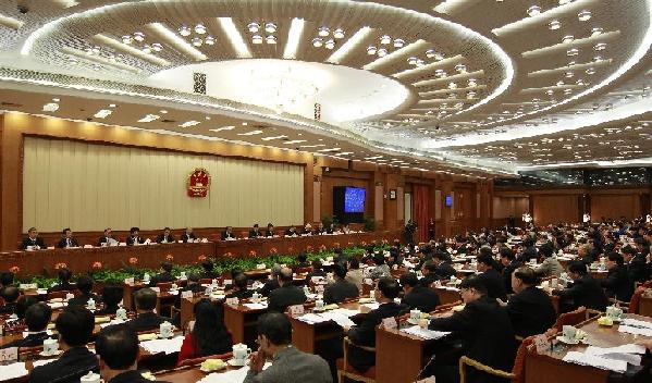 The presidium of the Fifth Session of the 11th National People's Congress (NPC) holds its fourth meeting at the Great Hall of the People in Beijing, capital of China, March 14, 2012. 