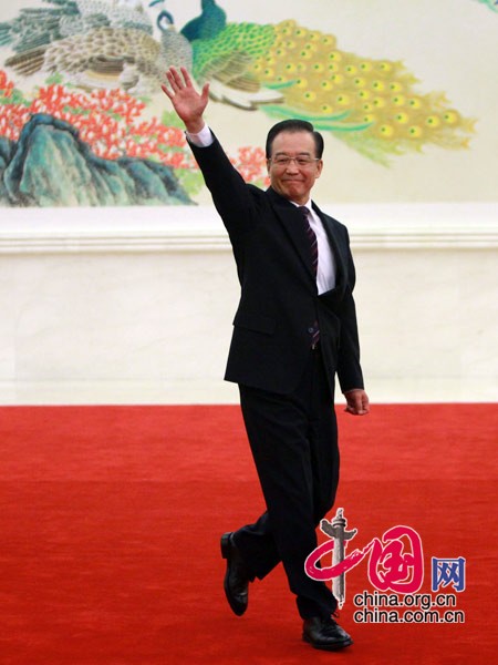 Chinese Premier Wen Jiabao meets the press after the closing meeting of the Fifth Session of the 11th National People&apos;s Congress (NPC) at the Great Hall of the People in Beijing, March 14, 2011.