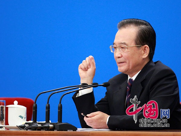 Chinese Premier Wen Jiabao meets the press after the closing meeting of the Fifth Session of the 11th National People&apos;s Congress (NPC) at the Great Hall of the People in Beijing, March 14, 2011.