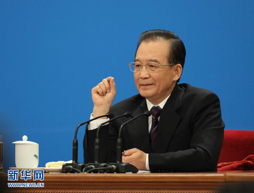 Chinese Premier Wen Jiabao meets the press after the closing meeting of the Fifth Session of the 11th National People&apos;s Congress (NPC) at the Great Hall of the People in Beijing, March 14, 2011.