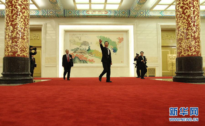 Chinese Premier Wen Jiabao meets the press after the closing meeting of the Fifth Session of the 11th National People&apos;s Congress (NPC) at the Great Hall of the People in Beijing, March 14, 2011.