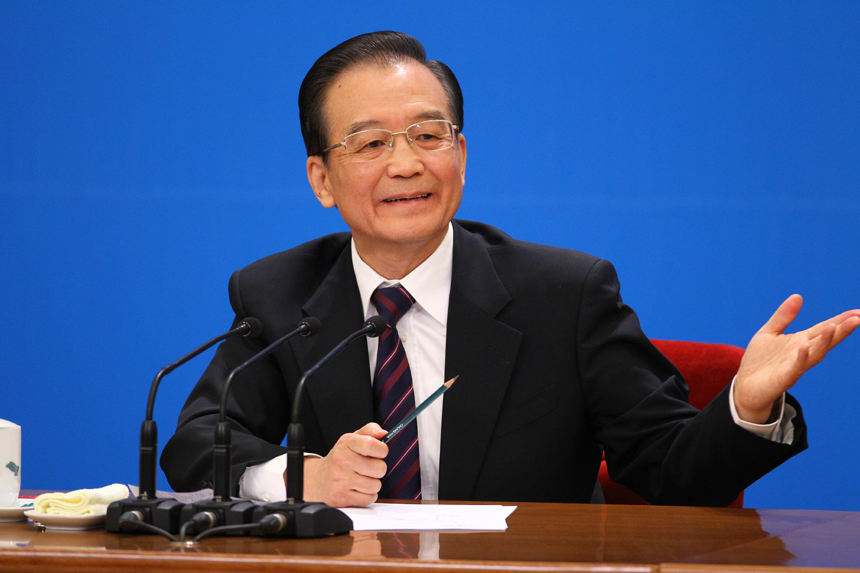 Chinese Premier Wen Jiabao meets the press after the closing meeting of the Fifth Session of the 11th National People&apos;s Congress (NPC) at the Great Hall of the People in Beijing, March 14, 2011. In the photo a reporter from Taiwan asks questions. 