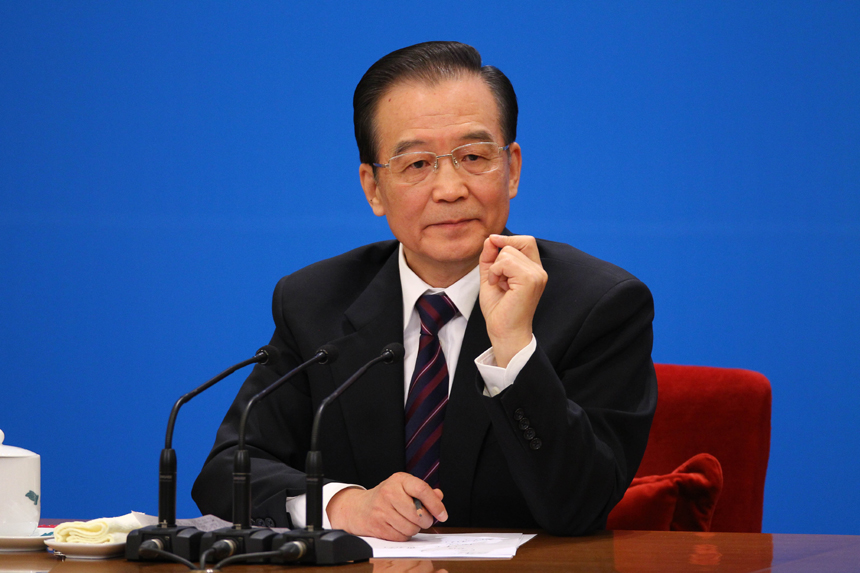 Chinese Premier Wen Jiabao meets the press after the closing meeting of the Fifth Session of the 11th National People&apos;s Congress (NPC) at the Great Hall of the People in Beijing, March 14, 2011. In the photo a reporter from Taiwan asks questions. 