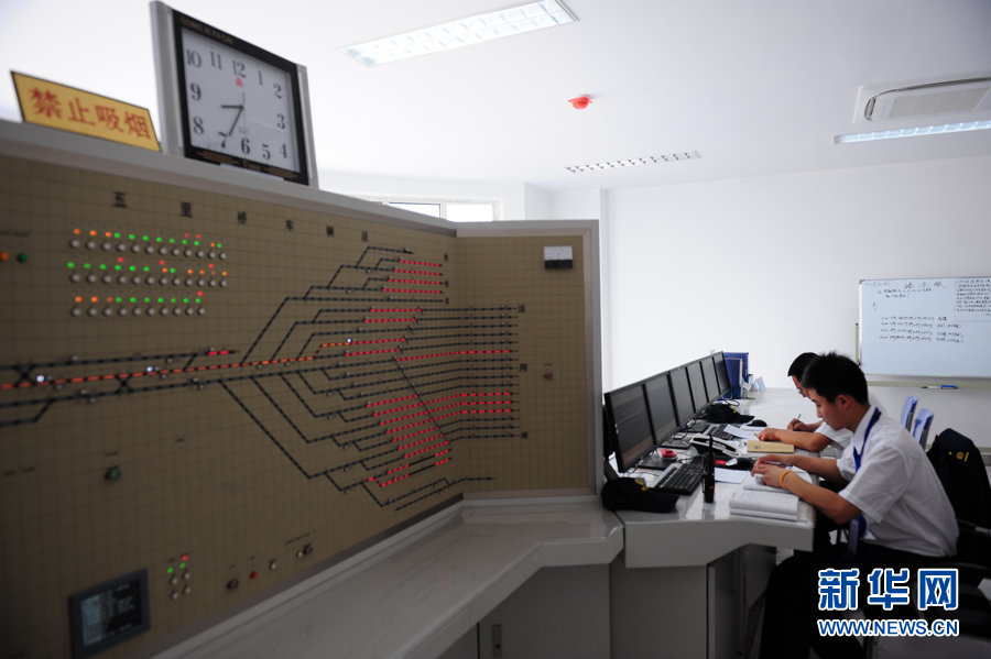 Technicians test communication equipment for subway line 6 (Phrase 1) which will open this September in Beijing, May 9, 2012. 