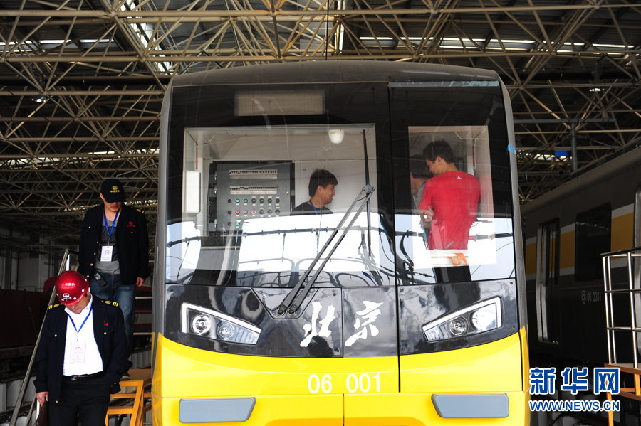 Technicians test communication equipment for subway line 6 (Phrase 1) which will open this September in Beijing, May 9, 2012. 