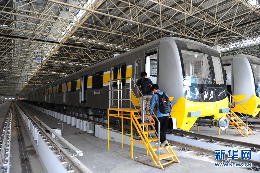 Technicians test communication equipment for subway line 6 (Phrase 1) which will open this September in Beijing, May 9, 2012. Beijing Subway Line 6 (Phrase 1) connects Wuliqiao Station in eastern Beijing to Wuluju Station in western Beijing.