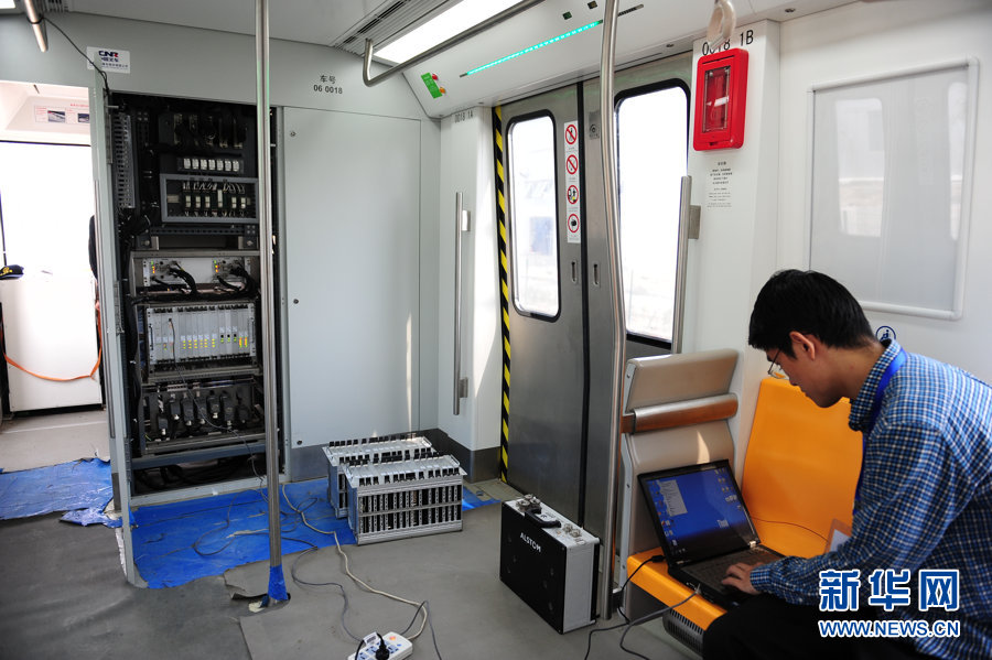 Technicians test communication equipment for subway line 6 (Phrase 1) which will open this September in Beijing, May 9, 2012. 