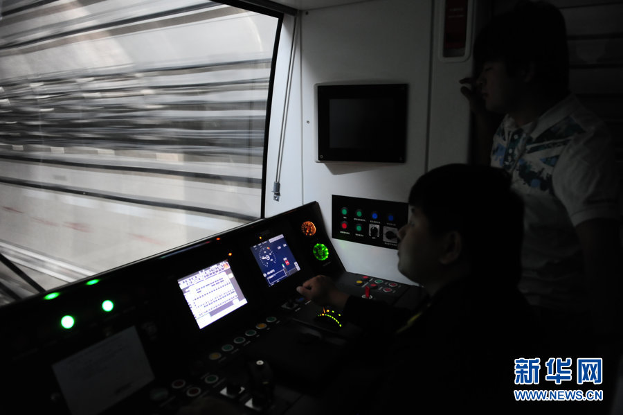 Technicians test communication equipment for subway line 6 (Phrase 1) which will open this September in Beijing, May 9, 2012. 