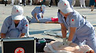 A team of doctors from the Red Cross Society of Hebei Province undertaking an emergency rescue drill.