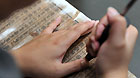 artist demonstrates the making of a printing block at the China Block Printing Museum in Yangzhou, east China's Jiangsu Province, May 17, 2012.