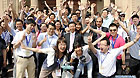 Chinese youth delegation members pose for a group photos outside the building of Punjab Assembly in eastern Pakistan's Lahore, May 16, 2012. The 100-member Chinese youth delegation visited Pakistan under the bilateral Youth Exchange Programme.