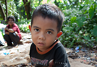 A child scavenger was looking to my camera at the Sports Complex Sukarno Jakarta.