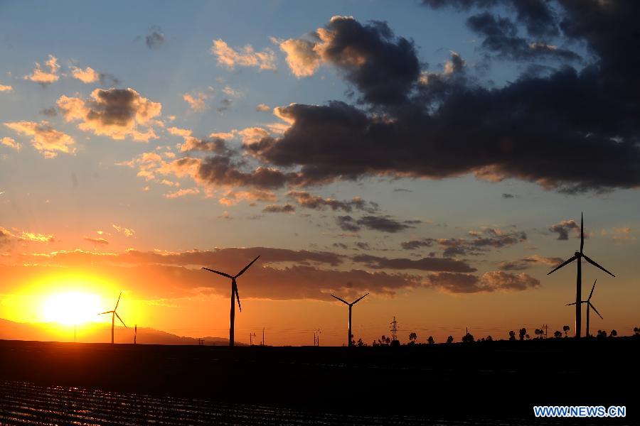 Photo taken on June 12, 2012 shows wind turbines that contribute energy to the Xiaowutai Wind Power Plant in Youyu County, north China's Shanxi Province. 