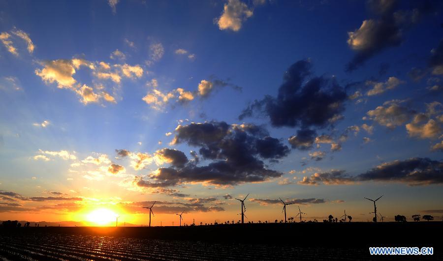 Photo taken on June 12, 2012 shows wind turbines that contribute energy to the Xiaowutai Wind Power Plant in Youyu County, north China's Shanxi Province.